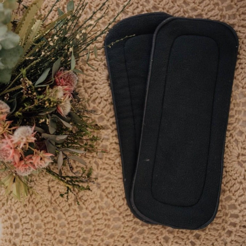 Discover unparalleled comfort with our Reusable Nappy Liners. Pack of 2 displayed as a flatlay