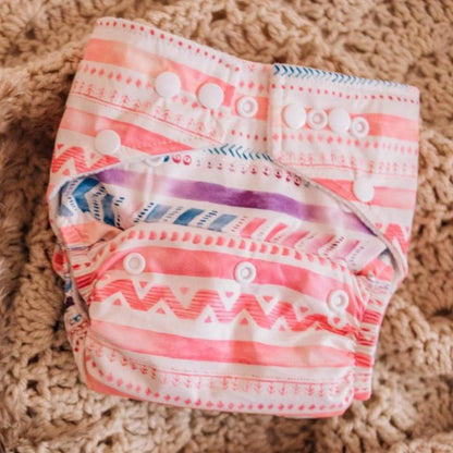 Switch to eco-friendly Modern Cloth Nappies (MCNs) for babies. Aztec design.