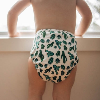 Switch to eco-friendly Modern Cloth Nappies (MCNs) for babies. Cacti lifestyle image.
