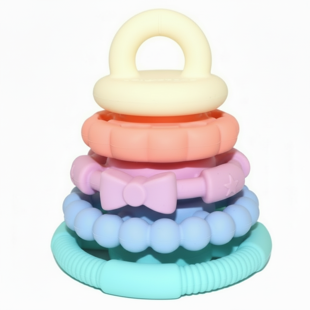Jellystone Designs Rainbow Teething Ring Stacker - Multi-Purpose Toy for Soothing and Stacking. Pastel ring stacker stacked on white background.